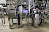 Aseptic Filling Line Krones 18000 bph - Container coding and filling level inspection